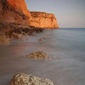 Sunset on the beach in Lagos, Algarve, Portugal, Europe