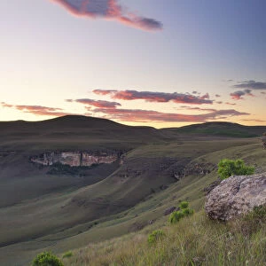 Sunset over Drakensberg mountains with orange, pink and blue - Giants Castle South Africa