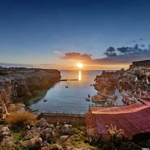 Sunset over Popeye Village, limits of Mellieha, Malta Sunset over Popeye Village, limits of Mellieha, Malta