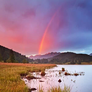 Sunset rainbow in German Alps