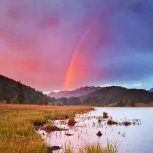 Sunset rainbow in German Alps