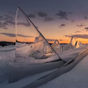 Sunset scene of Fin shape Iceberg