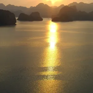 Sunset in the UNESCO-declared world natural heritage Halong Bay Viet Nam Sunset in the UNESCO-declared world natural heritage Halong Bay Viet Nam