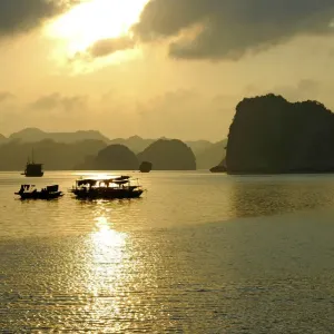 Sunset in the UNESCO-declared world natural heritage Halong Bay Viet Nam