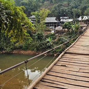 Suspension bridge leading to a village, Mai Chau valley, Northern Vietnam, Vietnam, Asia