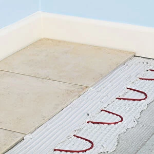 Tiles on floor laid on mesh mat