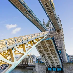 Tower Bridge opens over the river of Thames, London Tower Bridge opens over the river of Thames, London