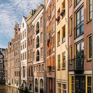 Traditional Dutch houses along the canal in Amsterdam, Netherlands
