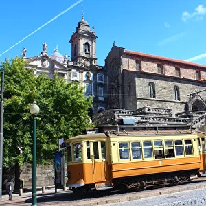 Tram and Church of San Francisco in Porto