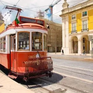 A tram in Praca do Comercio square A tram in Praca do Comercio square