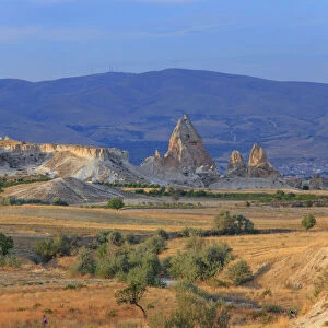Tufa volcanic rock formations in Red Valley, Goreme National Park, Goreme, Cappadocia, Anatolia, Turkey