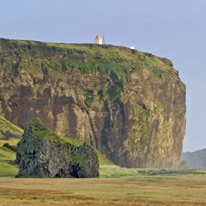 Tuff rock with a lighthouse, Dyrholaey, Vik i Myrdal, Southern Region, Iceland