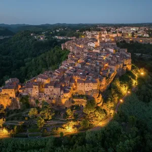 Tuscany, aerial view of the medieval town of Pitigliano, in the province of Grosseto, Italy at night evening Tuscany, aerial view of the medieval town of Pitigliano, in the province of Grosseto, Italy at night evening