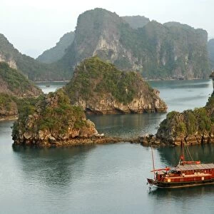Twilight over the island world of the UNESCO-declared world natural heritage Halong Bay Viet Nam