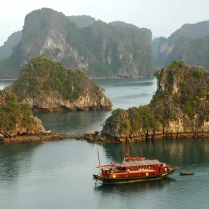 Twilight over the island world of the UNESCO-declared world natural heritage Halong Bay Viet Nam