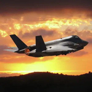 A U. S. Marine Corps Lockheed Martin F-35B Lightning II stealth fighter takeoff during sunset A U. S. Marine Corps Lockheed Martin F-35B Lightning II stealth fighter takeoff during sunset