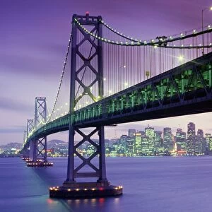 USA, California, San Francisco, Oakland Bay Bridge illuminated at dusk