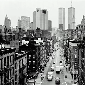USA, New York City, Chinatown street and Manhattan skyline (B&W)
