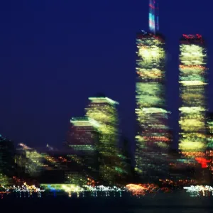 USA, New York City, skyline with World Trade Center, night (blurred)