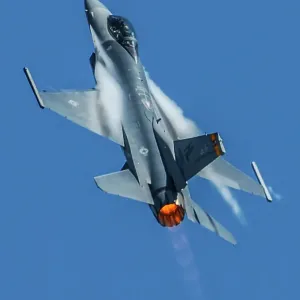 A USAF Lockheed Martin F-16C Viper going vertical in afterburner A USAF Lockheed Martin F-16C Viper going vertical in afterburner