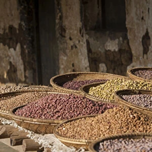 Various dried pulses in basket at market, Arusha, Tanzania, Africa