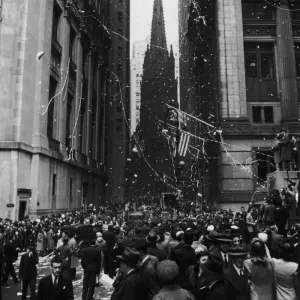 VE Day In New York; corner of Wall Street and Nassau Street in New York City during