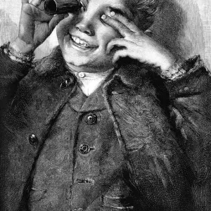 Victorian boy laughing as he looks through a kaleidescope