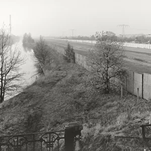 View over the Berlin Wall in 1985, panorama of the inner German border, known as the Death Strip, canal and fields in the autumn mist, Berlin, Germany, Europe