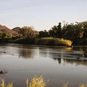 View over the border river of Kunene towards Angola, Kaokoland, Kunene Region, Namibia