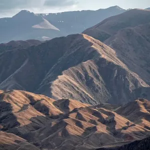 View over eroded mountainous landscape with brown hills, Konorchek Canyon, Chuy, Kyrgyzstan View over eroded mountainous landscape with brown hills, Konorchek Canyon, Chuy, Kyrgyzstan