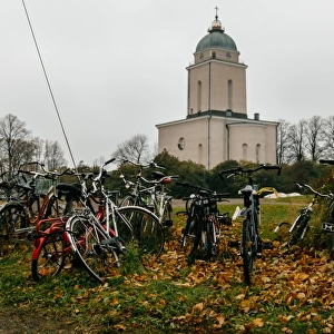 View on Suomenlinna Church with parked bicycles on a foreground, Finland