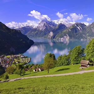 Views of Sisikon and Urnersee lake, part of Lake Lucerne, Swiss Path, Uri Alps or Urner Alps in Central Switzerland with the mountains Brunnistock, Uri-Rotstock and Oberbauenstock, Canton of Uri, Switzerland