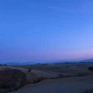 Vitaleta chapel in the landscape of Val d Orcia after sunset