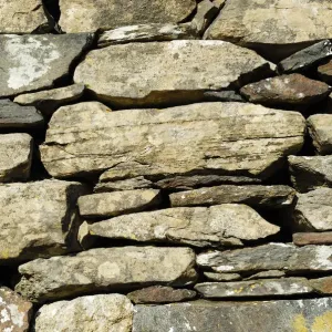 Wall of the historic early christian Saint Columcille abbey, constructed from piled up stones, Co Donegal Ireland Wall of the historic early christian Saint Columcille abbey, constructed from piled up stones, Co Donegal Ireland