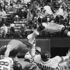 Walter Payton Jumps Over Gary Hrivnak Print Walter Payton Jumps Over Gary Hrivnak Print