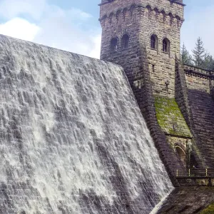 Water flowing over the Derwent Dam in the Peak District National Park