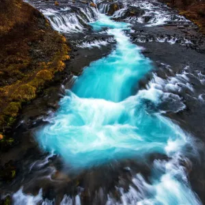 A waterfall from a glacial creek A waterfall from a glacial creek