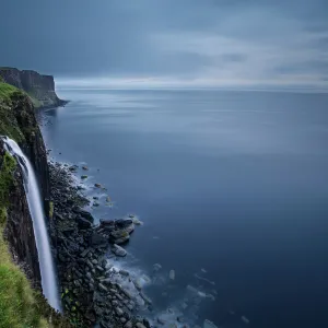 Waterfall at Kilt Rock on Isle of Skye on a gloomy cloudy morning