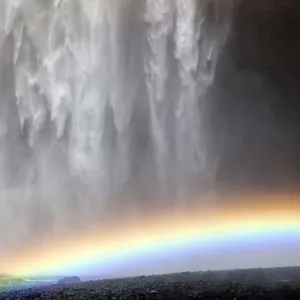 Waterfall with a rainbow, Skogafoss, Iceland Waterfall with a rainbow, Skogafoss, Iceland
