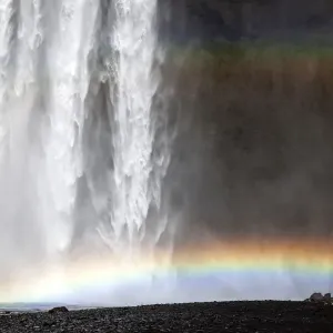 Waterfall with a rainbow, Skogafoss, Iceland Waterfall with a rainbow, Skogafoss, Iceland