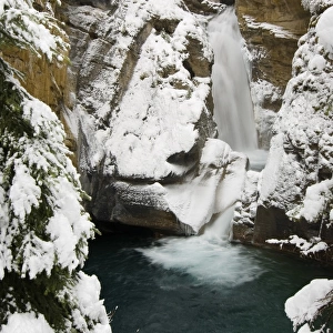 Waterfall in winter, Johnston Canyon, Banff National Park, Alberta, Canada
