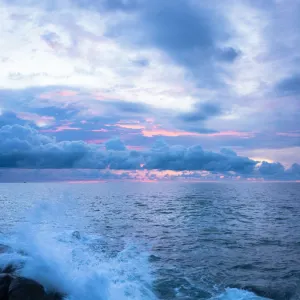 Wave splash at sunset, Dinawan Island, Sabah, Borneo