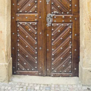 Weathered wooden door to old house