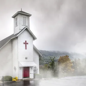 White church in the misty mountains