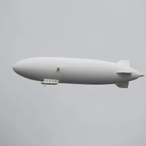 White zeppelin in the sky, lindau, germany White zeppelin in the sky, lindau, germany