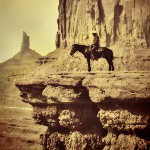 Wildwest Coyboy on Horse in Old Retro Antique Sepia Tone