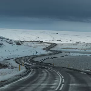 Winding road through Iceland winter landscape
