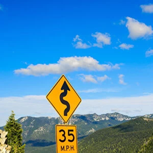 Winding road sign on Chinook Pass, just outside of Mt. Rainer National Park, Washington State, USA