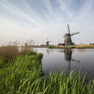 Windmill reflected in the canal Holland