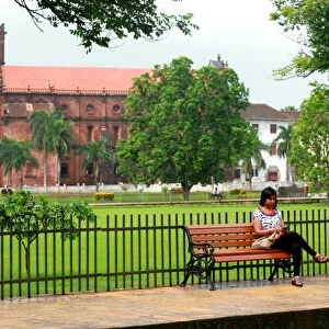 Woman in front of Basilica of Bom Jesus at Old Goa